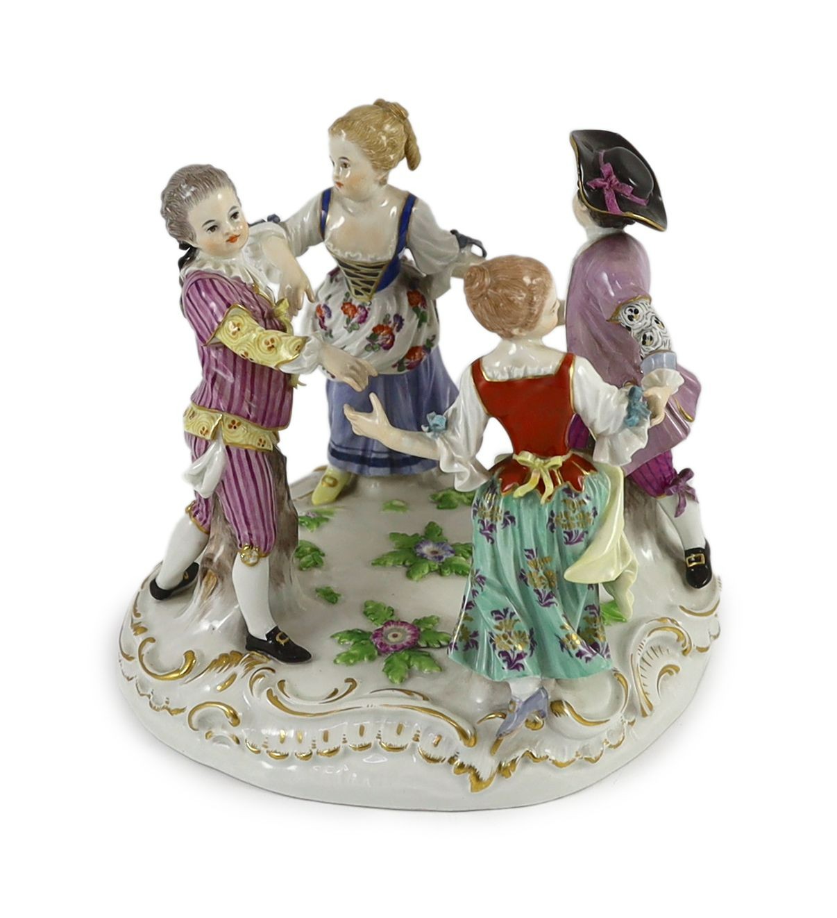 A Meissen group of four dancing children, early 20th century, 15 cm high